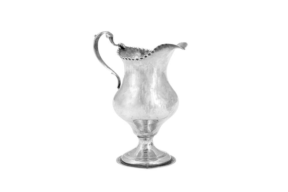 Lot 492 - A George III sterling silver cream jug, London 1781 by Hester Bateman