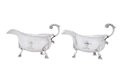 Lot 698 - A pair of George II sterling silver sauceboats, London 1747 by Benjamin Cartwright I