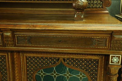 Lot 654 - λ AN IMPRESSIVE MOTHER-OF-PEARL-INLAID HARDWOOD AND STAINED GLASS ORIENTALIST CUPBOARD