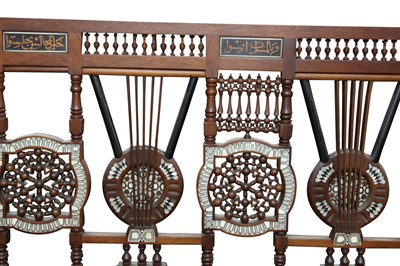 Lot 660 - λ A LONG HARDWOOD IVORY AND MOTHER-OF-PEARL-INLAID ORIENTALIST SETTEE