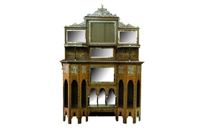 Lot 337 - λ A HARDWOOD MOTHER-OF-PEARL-INLAID LIBERTY & CO. OTTOMAN-REVIVAL ORIENTALIST CUPBOARD
