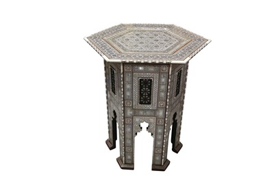 Lot 327 - λ A LARGE HARDWOOD MOTHER-OF-PEARL AND IVORY-INLAID OCCASIONAL TABLE