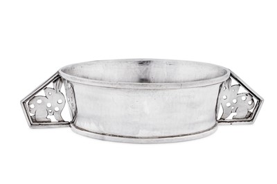 Lot 430 - A George V Arts and Crafts sterling silver porridge or christening bowl, London 1934 by Teressa M Harley