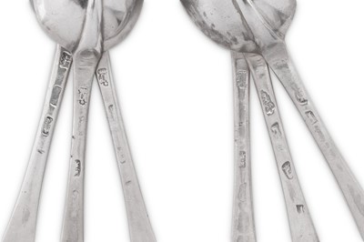 Lot 343 - A matched set of six Queen Anne / George I Britannia standard silver tablespoons, three London 1708 by John Ladyman