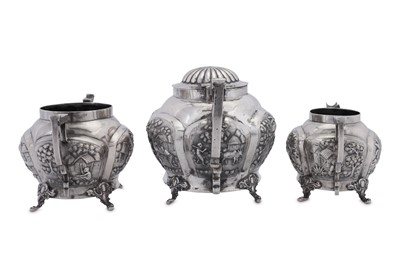 Lot 177 - An early 20th century Anglo – Indian unmarked white metal three-piece tea service, Calcutta circa 1930