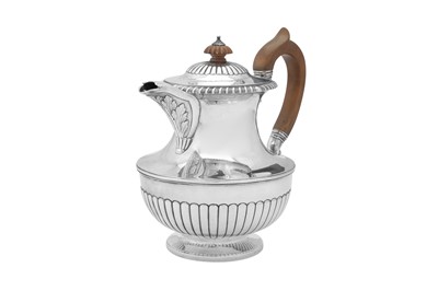 Lot 497 - A George IV sterling silver coffee pot or jug, London 1822 by Richard Sibley I