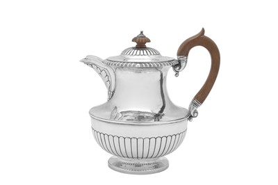 Lot 497 - A George IV sterling silver coffee pot or jug, London 1822 by Richard Sibley I