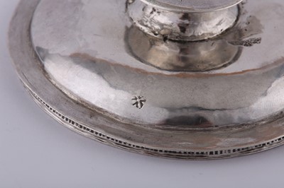 Lot 571 - An Elizabethan East Anglian provincial silver paten (communion cup cover), probably Waveney Valley circa 1560-80