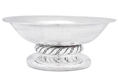 Lot 436 - A George V ‘Arts and Crafts’ sterling silver fruit bowl, Birmingham 1928 by Liberty and Co