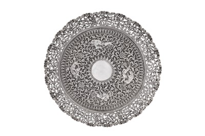 Lot 203 - A late 19th century Anglo – Indian unmarked silver tray, Cutch circa 1880 attributed to Oomersi Mawji (active 1860-90)