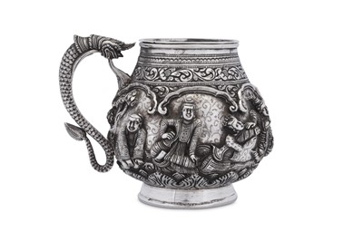 Lot 210 - An early 20th century Burmese unmarked silver mug, Thayetmyo circa 1910