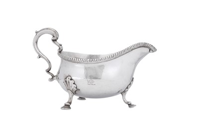 Lot 548 - A George II sterling silver sauceboat, London 1759 by David Hennell (first reg. 23rd June 1736)