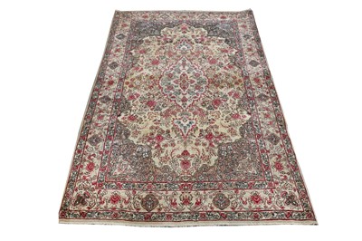 Lot 99 - AN ANTIQUE KIRMAN LAVER RUG, SOUTH PERSIA