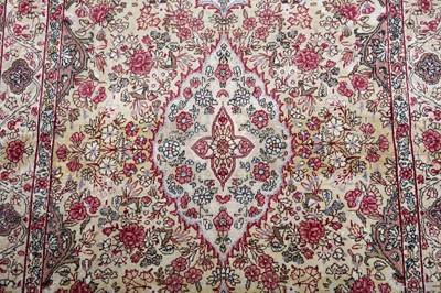 Lot 99 - AN ANTIQUE KIRMAN LAVER RUG, SOUTH PERSIA