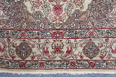 Lot 99 - AN ANTIQUE KIRMAN LAVER RUG, SOUTH PERSIA