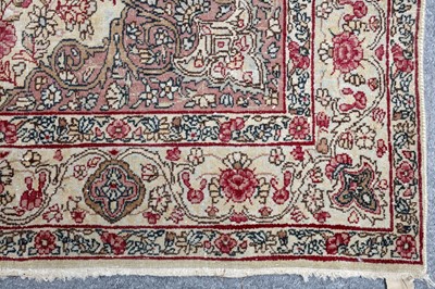 Lot 99 - AN ANTIQUE KIRMAN LAVER RUG, SOUTH PERSIA