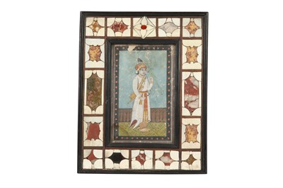 Lot 61 - λ A PORTRAIT OF AN INDIAN PRINCE WITH A PARAKEET