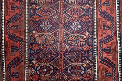 Lot 31 - A N ANTIQUE BALOUCH RUG, NORTH-EAST PERSIA