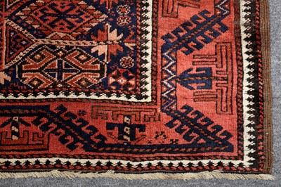 Lot 31 - A N ANTIQUE BALOUCH RUG, NORTH-EAST PERSIA
