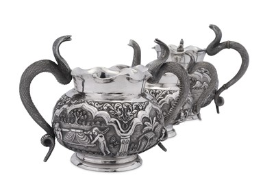 Lot 173 - An early 20th century Anglo – Indian unmarked silver three-piece tea service, Calcutta circa 1910