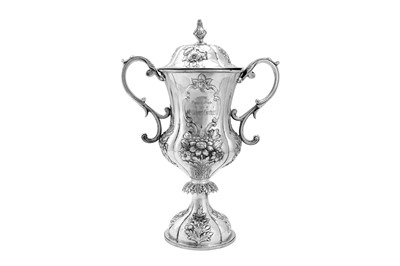 Lot 170 - A mid-19th century Indian colonial silver twin handled cup and cover, Calcutta circa 1860 by Hamilton and Co