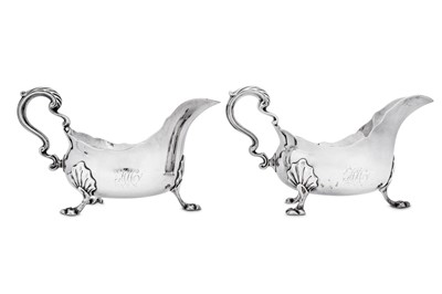 Lot 550 - A pair of George II provincial sterling silver sauceboats, Newcastle 1754 by Issac Cookson