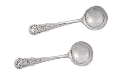Lot 373 - A pair of George II sterling silver cast sauce ladles, London 1750 by Peter Taylor (reg. 11th Nov 1740)