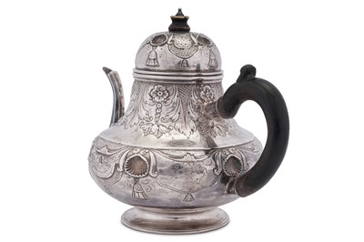 Lot 115 - An early 18th century Dutch silver teapot, Harlem 1736 by Jan Verdoes (active 1734-68)