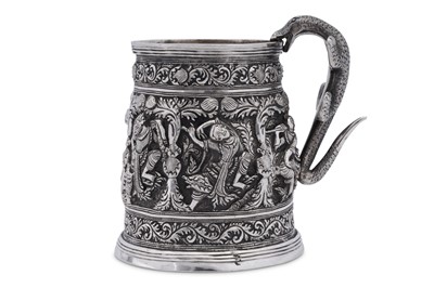 Lot 209 - A late 19th / early 20th century Burmese unmarked silver mug, upper Burma circa 1900