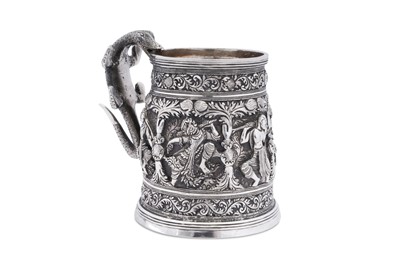Lot 209 - A late 19th / early 20th century Burmese unmarked silver mug, upper Burma circa 1900