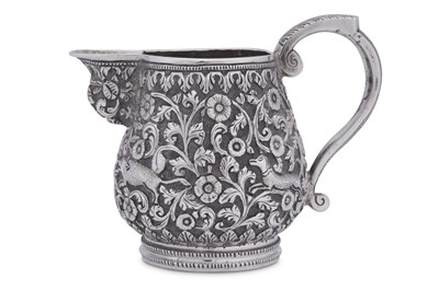 Lot 199 - A late 19th century Anglo – Indian unmarked silver cream or milk jug, Cutch circa 1880