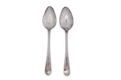Lot 314 - A pair of George III Irish provincial silver dessert spoons, Cork circa 1800 by John Toleken (active 1798-1836)