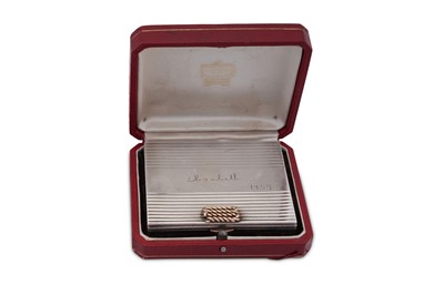 Lot 99 - A mid-20th century French 950 standard silver and 18 carat gold mounted compact, Paris dated 1954, retailed by Cartier