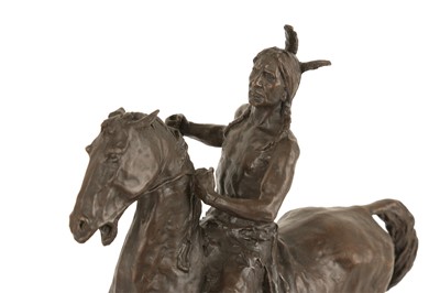 Lot 236 - A BRONZE EQUESTRIAN MODEL OF A NATIVE AMERICAN INDIAN ON HORSEBACK