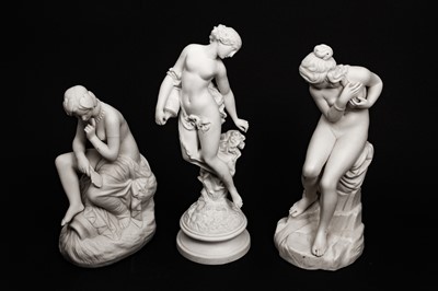 Lot 175 - THREE LATE 19TH CENTURY BISCUIT PORCELAIN FIGURES OF NUDE MAIDENS
