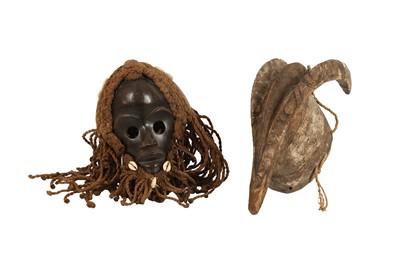 Lot 277 - A TRIBAL HARDWOOD MASK IN THE FORM OF AN ANTALOPE, 20TH CENTURY