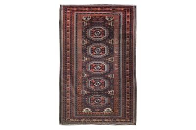 Lot 9 - AN ANTIQUE BALOUCH RUG, NORTH-EAST PERSIA