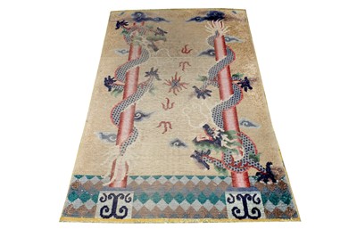 Lot 71 - A SILK CHINESE RUG