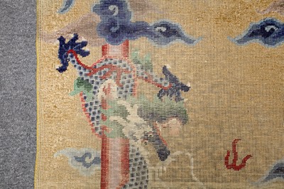 Lot 71 - A SILK CHINESE RUG