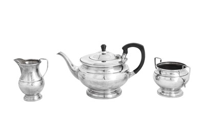 Lot 592 - A GARRARD SILVER PLATED THREE PIECE TEA SET, MID 20TH CENTURY