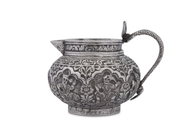 Lot 182 - An early 20th century Anglo - Indian unmarked silver cream jug, Lucknow circa 1910