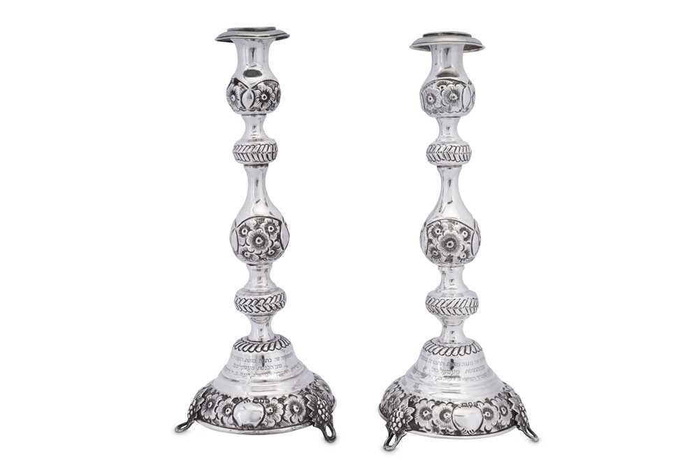 Lot 105 - A pair of George V sterling silver sabbath candlesticks, London 1918 by Rosenzweig, Taitelbaum & Co (Jacob Rozenzweig)