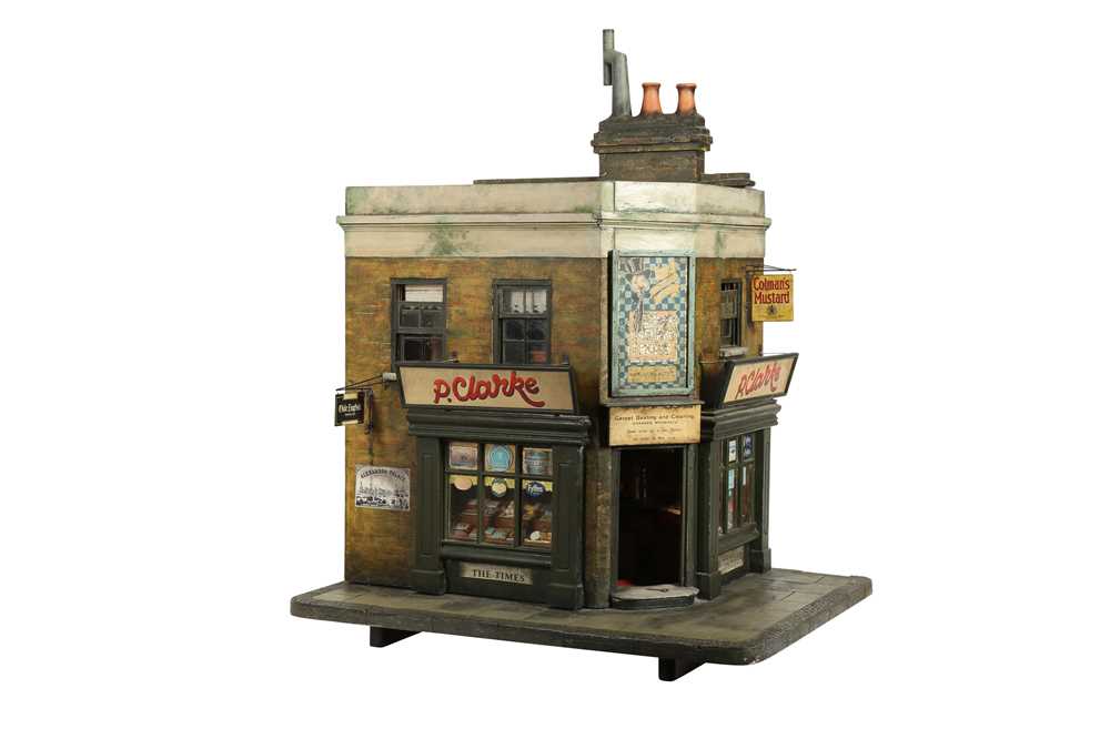 Lot 206 - MODELS: A LARGE SCRATCH BUILT MODEL OF A CORNER SHOP, 20TH CENTURY