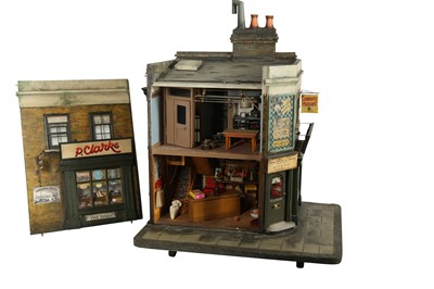 Lot 206 - MODELS: A LARGE SCRATCH BUILT MODEL OF A CORNER SHOP, 20TH CENTURY