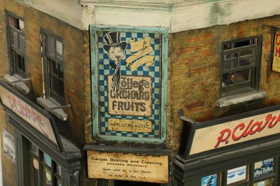 Lot 206 - MODELS: A LARGE SCRATCH BUILT MODEL OF A CORNER SHOP, 20TH CENTURY