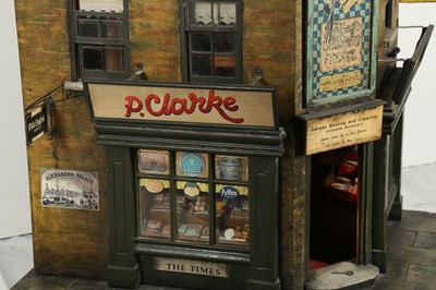 Lot 206 - MODELS: A LARGE SCRATCH BUILT MODEL OF A CORNER SHOP, 20TH CENTURY