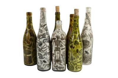 Lot 228 - GLASS: A GROUP OF SEVEN DECORATIVE DECALCOMANIA BOTTLES, MID 20TH CENTURY