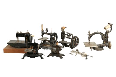 Lot 238 - HABERDASHERY: A WILCOX AND GIBBS TABLE MOUNTED MINIATURE SEWING MACHINE
