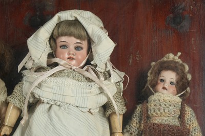 Lot 183 - DOLLS: THREE CONTINENTAL BISQUE HEAD DOLLS, PROBABLY GERMAN, EARLY 20TH CENTURY