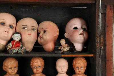 Lot 185 - DOLLS: A LARGE COLLECTION OF PLASTIC AND BISQUE DOLLS HEADS, 20TH CENTURY